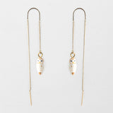 Long white owl earrings