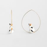 Sitting cat creoles