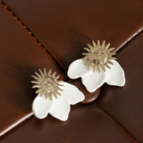 Boucles d'oreilles soleil blanc
