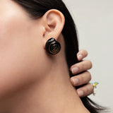 Black snail stud earrings