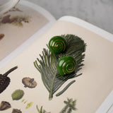 Green snail stud earrings