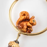 Squirrel and acorn hoop earrings