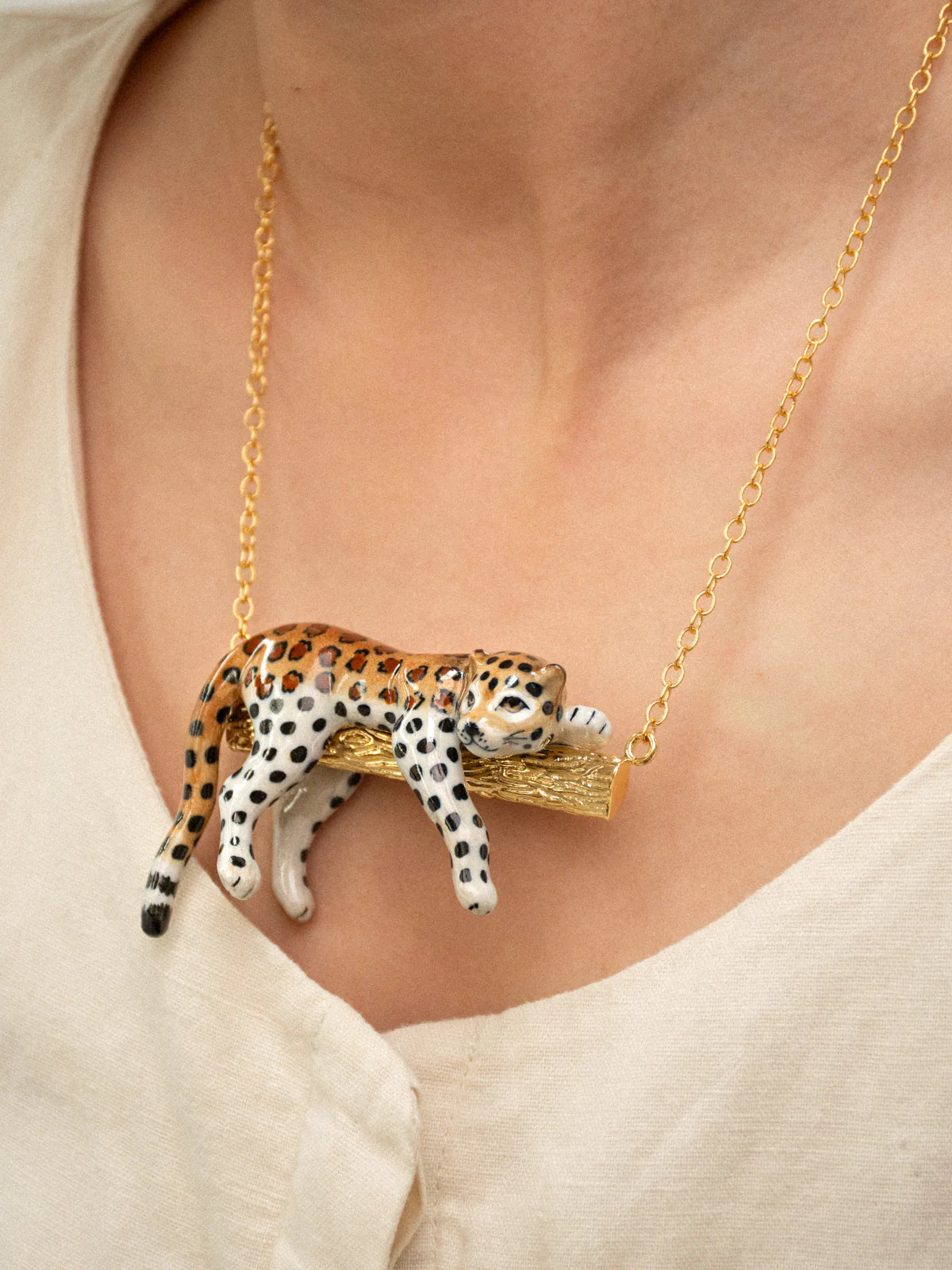 Leopard on branch necklace in porcelain and gilded brass – NACH BIJOUX