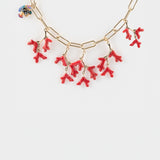 Red coral and spotted fish necklace