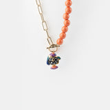 Pearl and spotted fish necklace