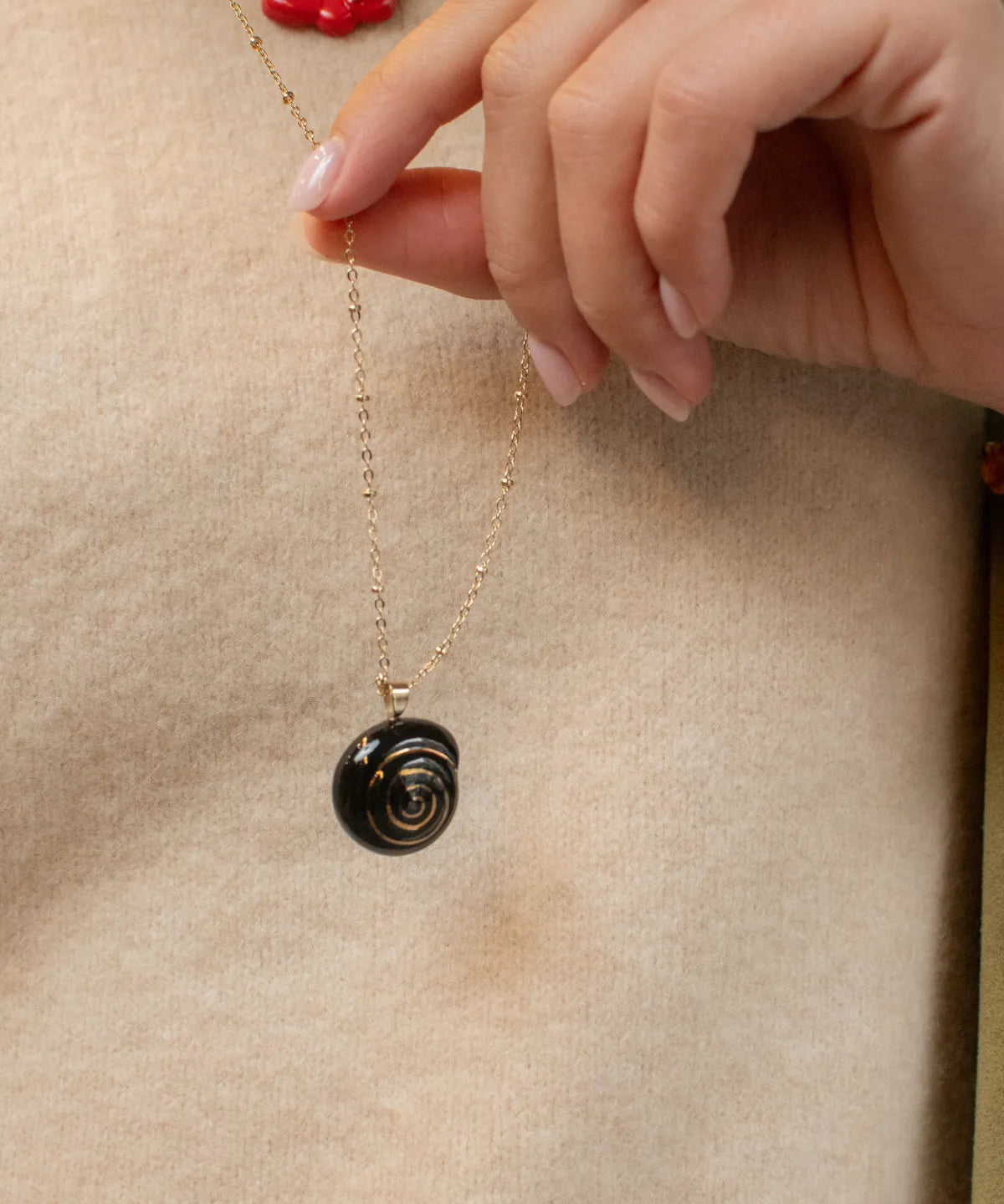 Black snail necklace