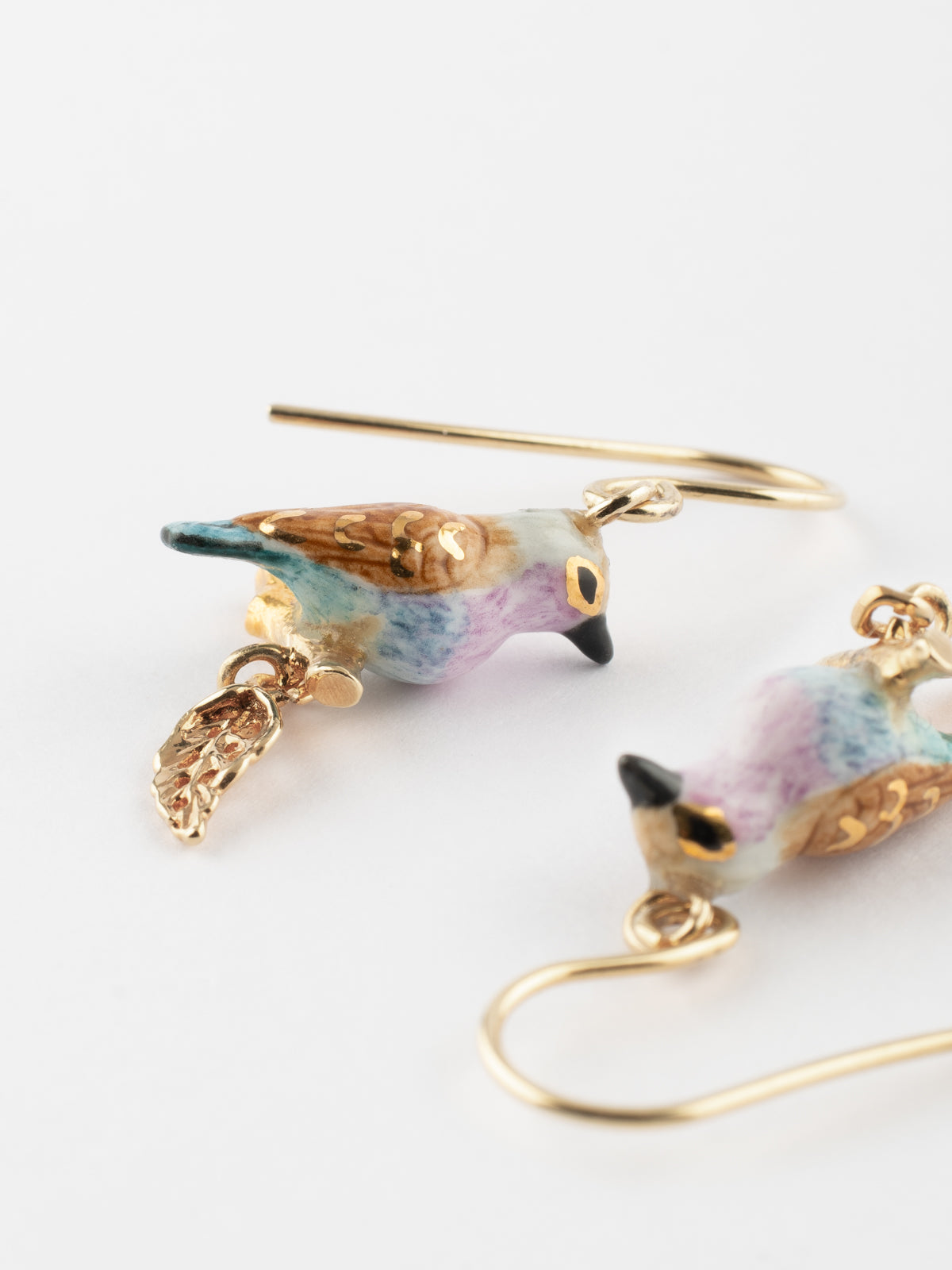 Boucles d'oreilles pendantes oiseau & feuille d'or