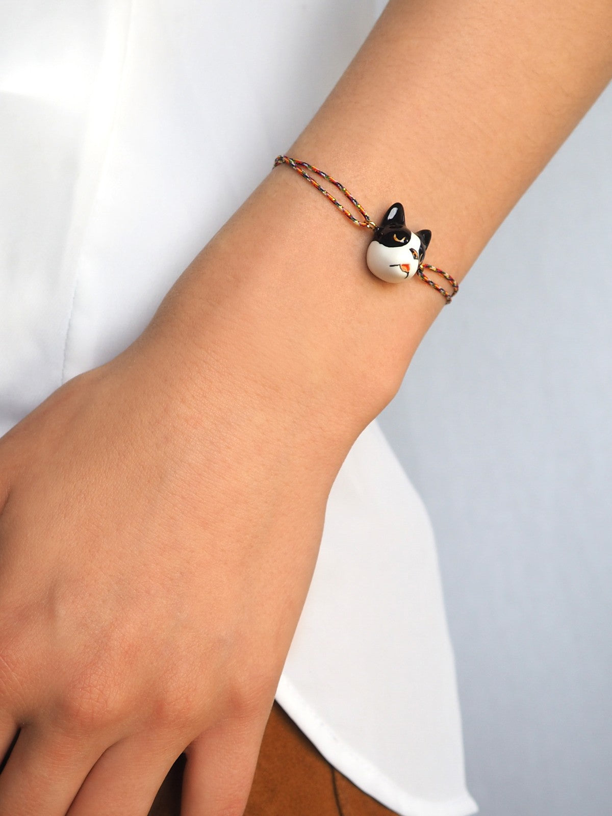 bracelet ajustable en porcelaine peinte à la main et coton animal bouledoque