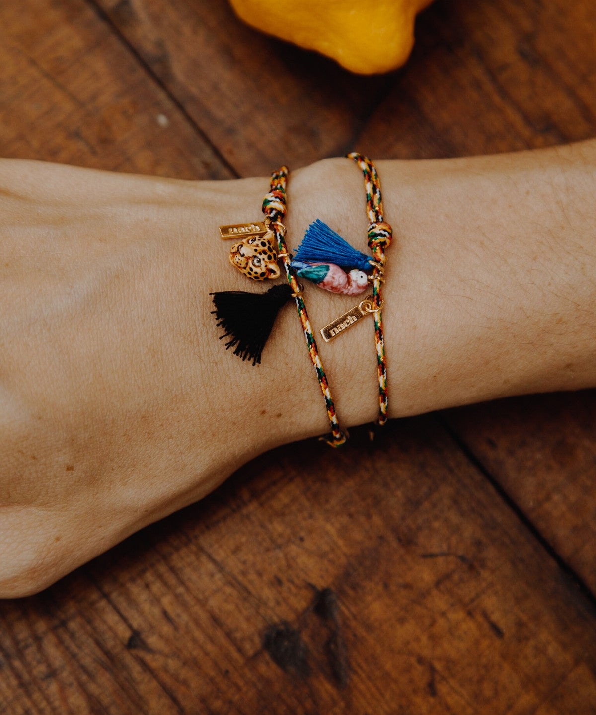 Bracelet corde oiseau pompon