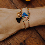 Bracelet corde oiseau pompon