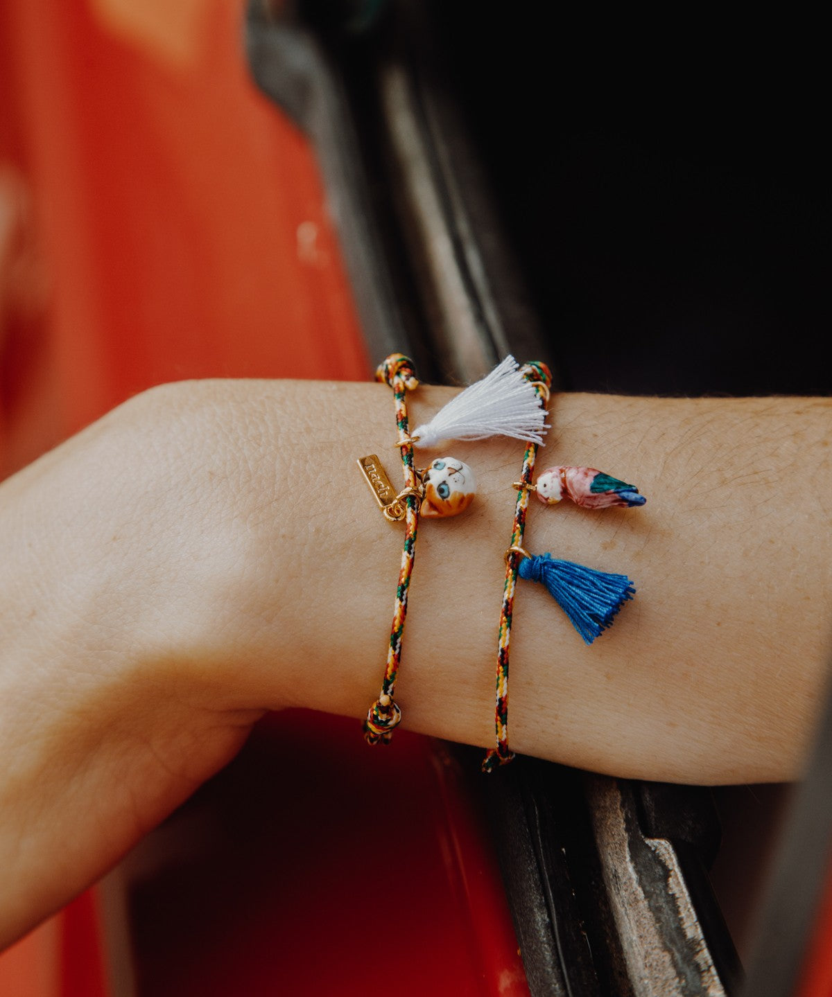 Bracelet corde oiseau pompon