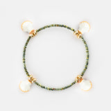 Bracelet perles d'hématite coquillage