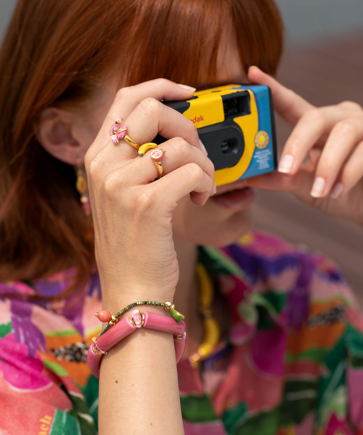 Bracelet perles roses cacatoès