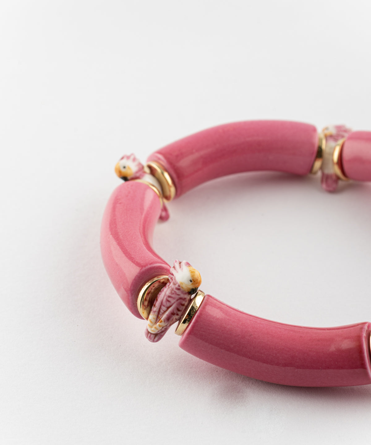 Bracelet perles roses cacatoès