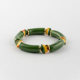 Bracelet perles vertes oiseau de paradis