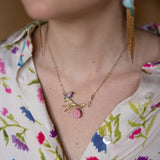 Collier oiseau et chardon rose