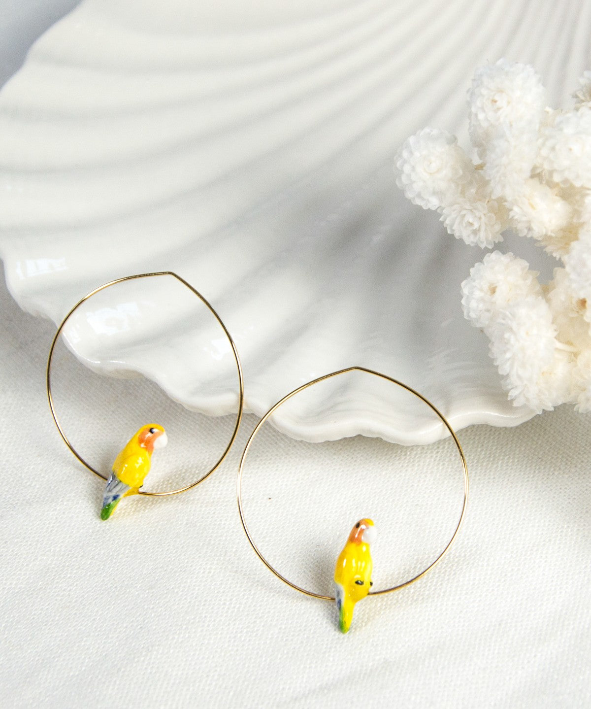 créoles oiseau perroquet jaune