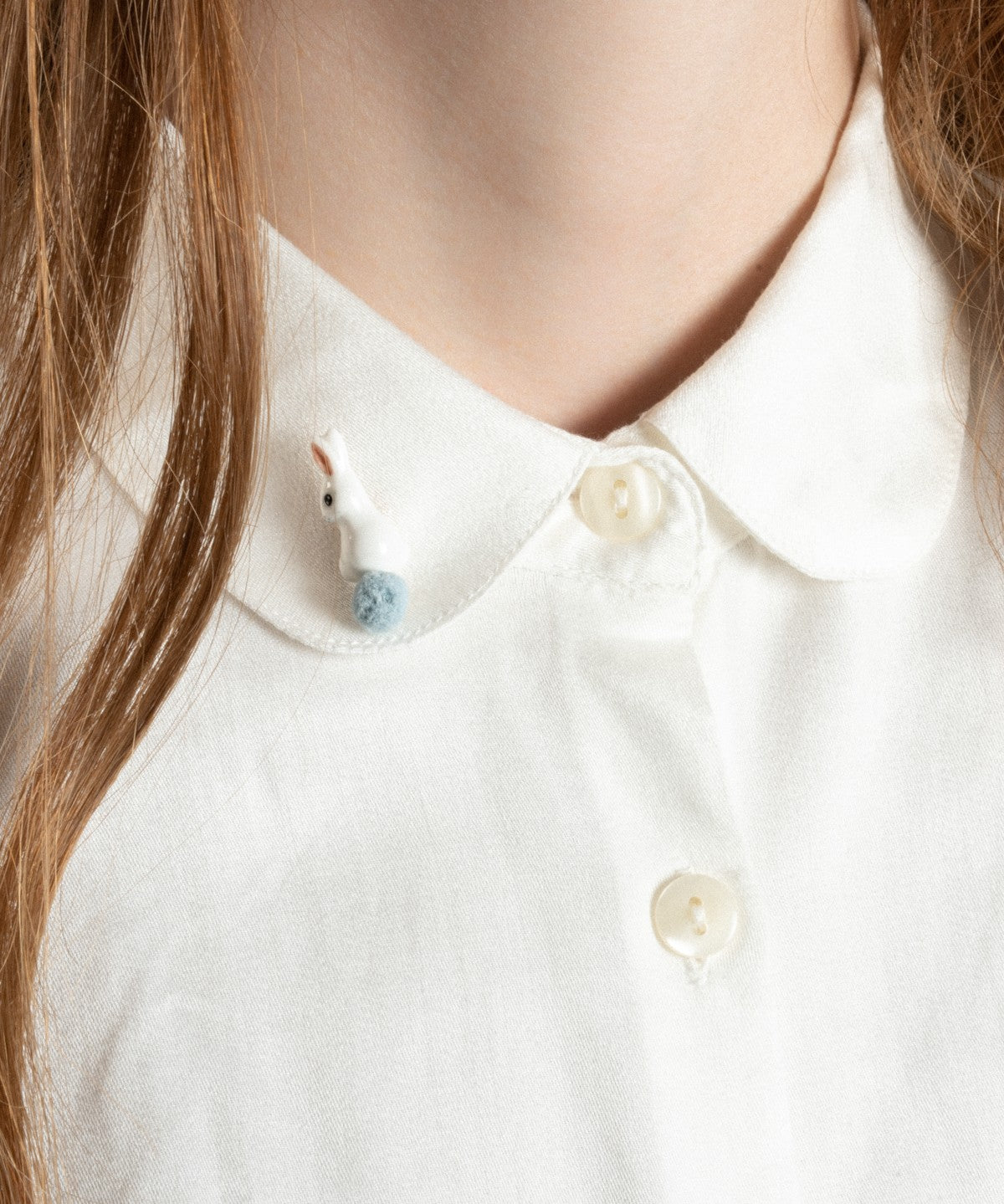 Pin's lapin avec pompon