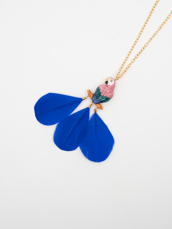 golden necklace blue parrot pink feather