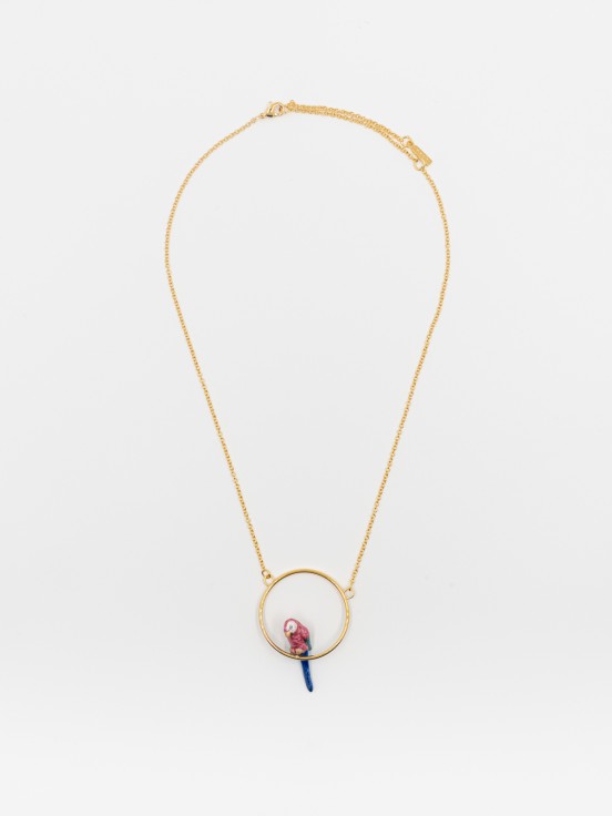 round gold necklace with pink and blue parrot