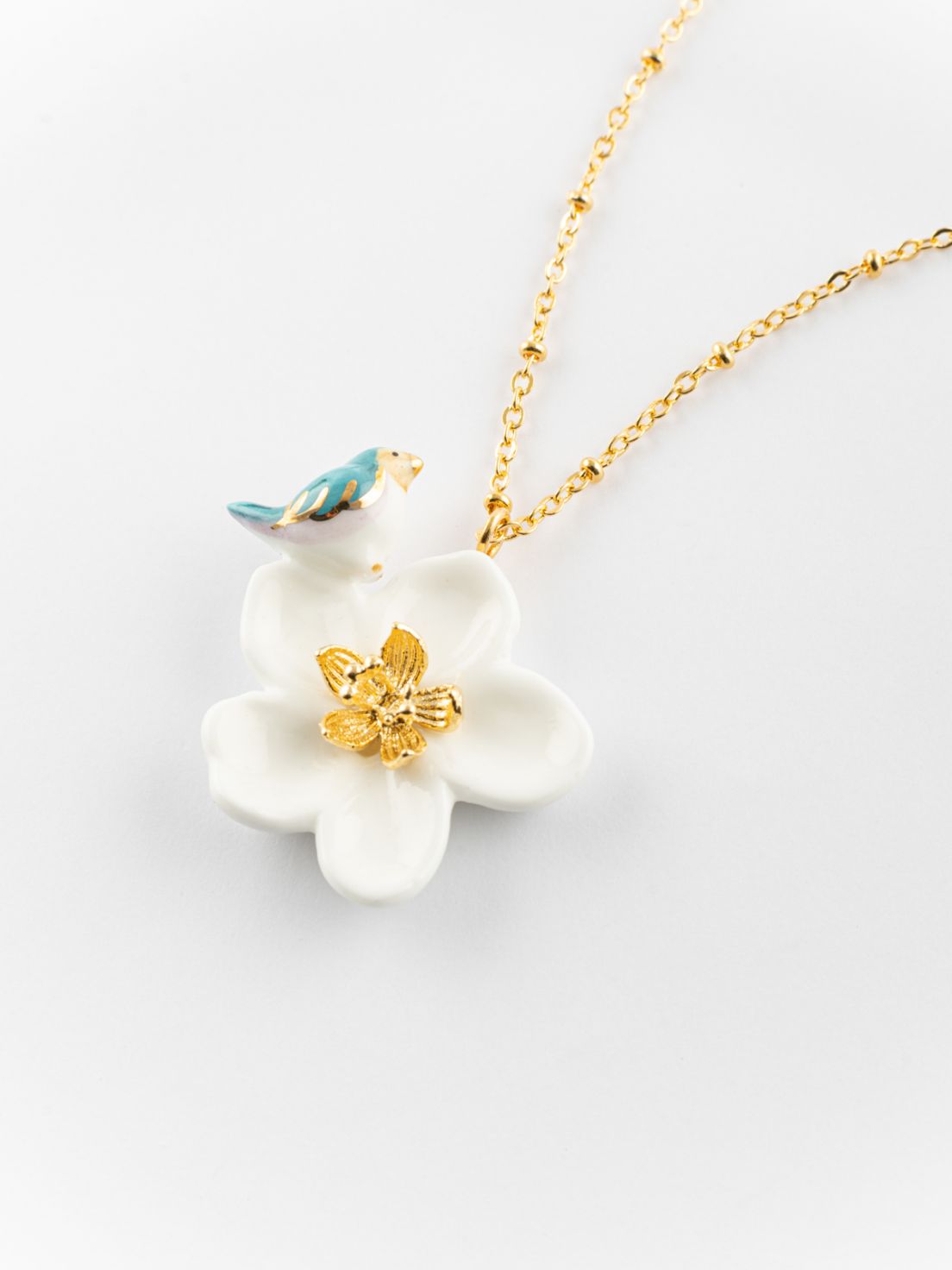 Porcelain pear tree flower & bird necklace.