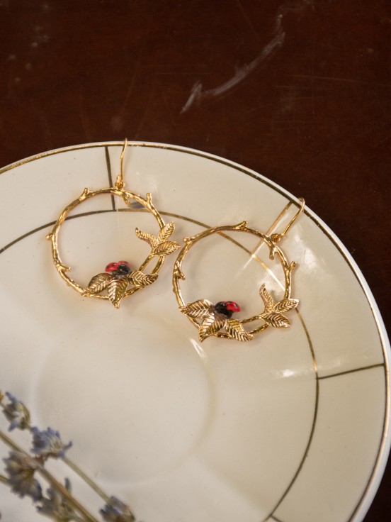 Round golden ladybug porcelain branch earrings