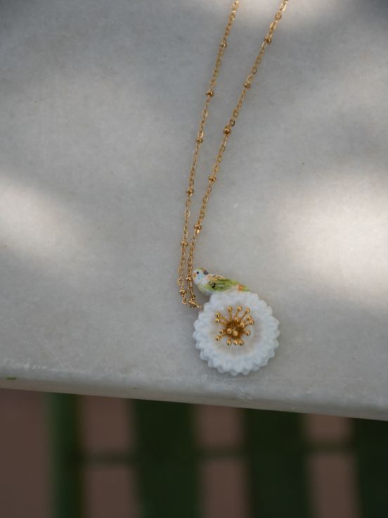 White dandelion on budgerigar necklace