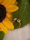 bird and sunflower ring in porcelain and golden brass