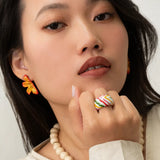 Boucles d'oreilles puces -  demi fleur de lys tigrée