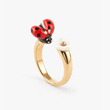FaceToFace ring with ladybug and white flower