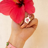 Pink braided bracelet with charms