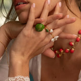Green snail ring