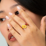 Bague FacetoFace hibiscus et coccinelle