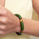Bracelet perles vertes oiseau de paradis