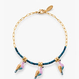 Bracelet en perles d'hématite et oiseaux