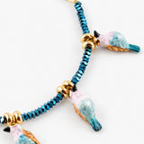 Bracelet en perles d'hématite et oiseaux
