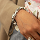 White and gold leopard kiss bracelet