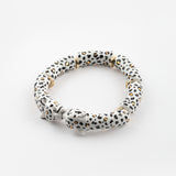 White and gold leopard kiss bracelet