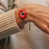 Red anemone iridescent cord bracelet