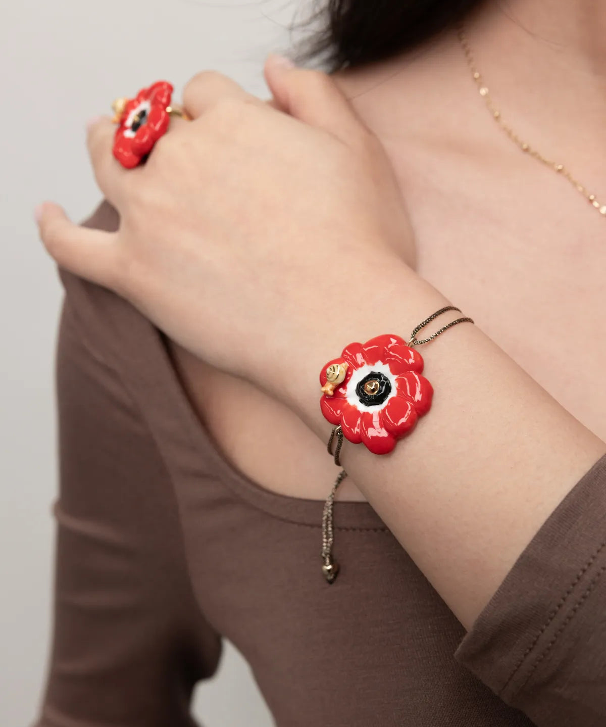 Red anemone iridescent cord bracelet