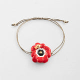 Red anemone iridescent cord bracelet