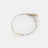 Bracelet perles et fleur blanches