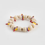 Bracelet oiseau diamant de Gould et perles