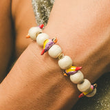 Bracelet oiseau diamant de Gould et perles