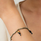 hematite bead and toucan bracelet