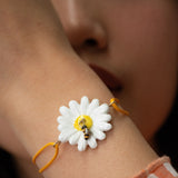 Bracelet cordon marguerite et abeille