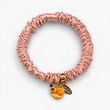 Pulsera fetiche rosa, seda y zorro