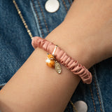 Pulsera fetiche rosa, seda y zorro