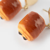Heart and chocolate croissant ear studs