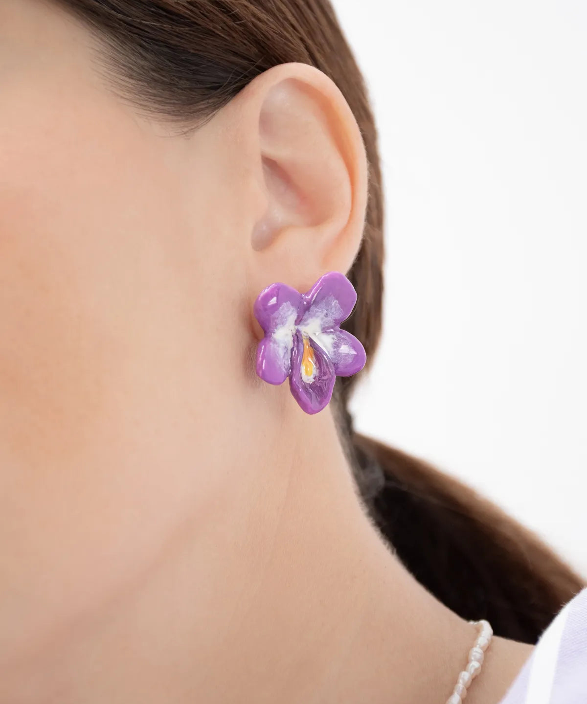 Puces d'oreilles violette